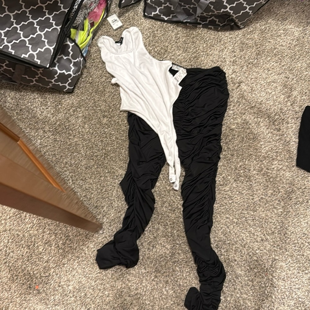 Women’s clothes 
Ruffled leggings (large)
Body suit (large)